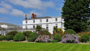 Hotel exterior in the sunshine - Rowton Hall Hotel, Chester