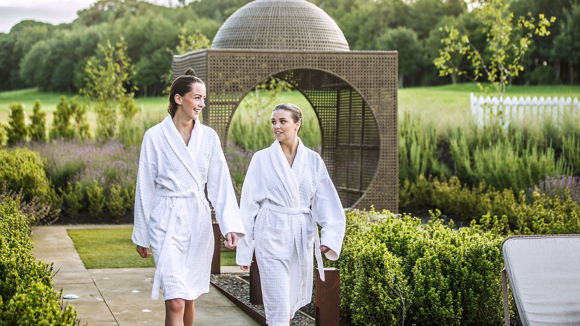 Guests in robes enjoying the Spa Garden - Ramside Hall Hotel, Durham