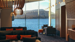 The Atrium with floor to ceiling windows showcasing the view of the lake - Low Wood Bay Resort, Lake Windermere