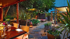 The Secret Garden with fairy lights at night - Berkeley Square Hotel, Bristol