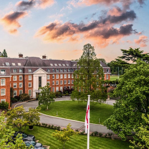 Hotel exterior overlooking the driveway at sunset - The Lensbury, Teddington