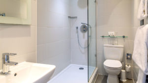 Bathroom of a classic double room - The Lensbury, Teddington