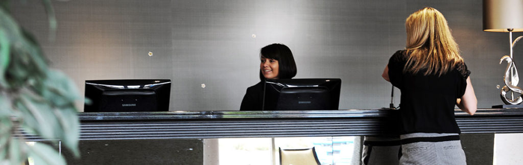 Receptionist working at a hotel - Classic British Hotels
