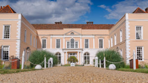 Grand hotel exterior in the sunshine - Hintlesham Hall Hotel, Suffolk