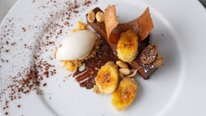 Photo of a dining plate with an artfully plated meal at Gonville Hotel, Cambridge