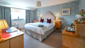 The Jockey Club, Newmarket, deluxe double room featuring a sophisticated interior