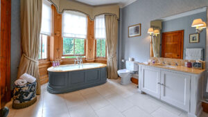 Elegant bathroom in the deluxe double room at The Jockey Club, Newmarket.