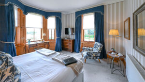 Deluxe double room at The Jockey Club, Newmarket, offering comfort and elegance