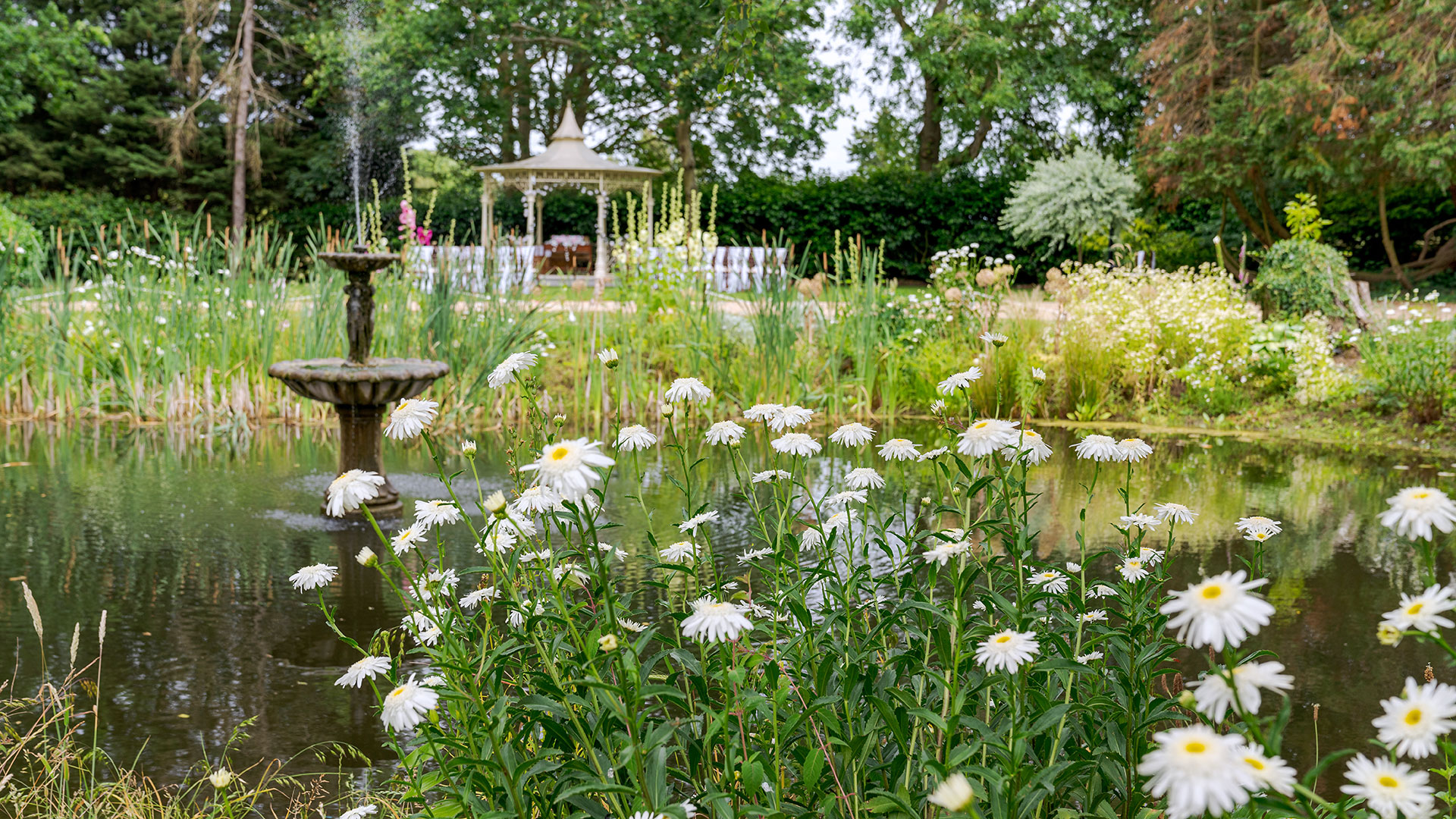 Garden at Hintlesham Hall Hotel, Suffolk, offering a peaceful and scenic space for relaxation - Classic British Hotels